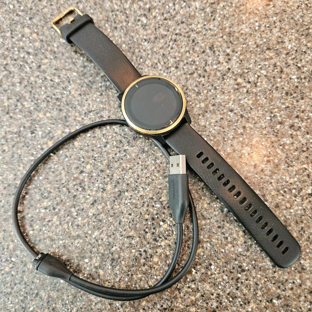 Garmin Venu with charger